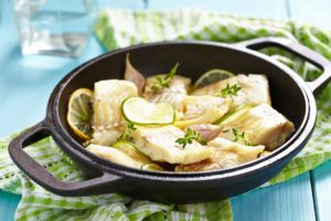 Baked fish fillet with lime and garlic